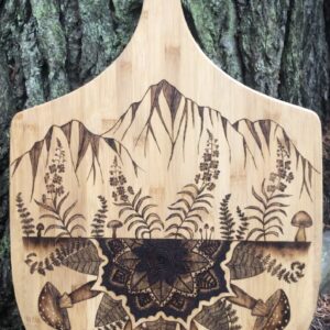 Mountain, fireweed and mandala below pizza peel